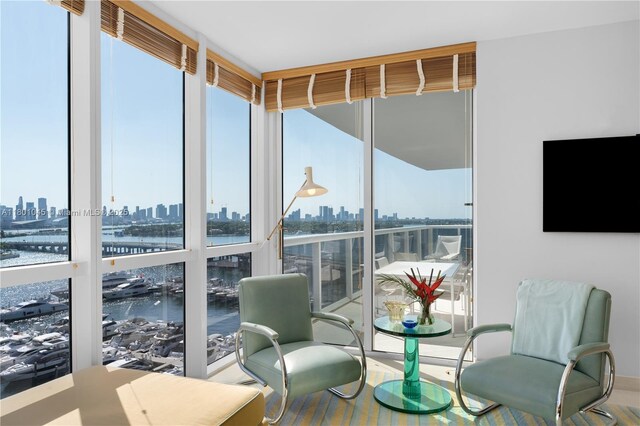 400 Alton Rd Unit 1101, Miami Beach, FL 33139 - sunroom featuring a view of skyline and a water view