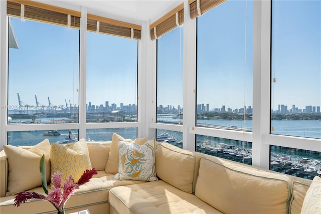 400 Alton Rd Unit 1101, Miami Beach, FL 33139 - sunroom / solarium featuring a view of skyline, plenty of natural light, and a water view