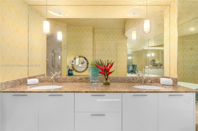 400 Alton Rd Unit 1101, Miami Beach, FL 33139 - bathroom featuring double vanity and a shower