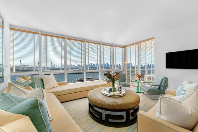 400 Alton Rd Unit 1101, Miami Beach, FL 33139 - living room featuring wood finished floors and baseboards