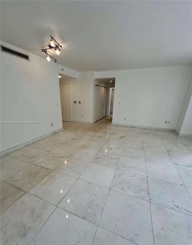 901 Brickell Key Blvd Unit 603, Miami, FL 33131 - unfurnished room with baseboards