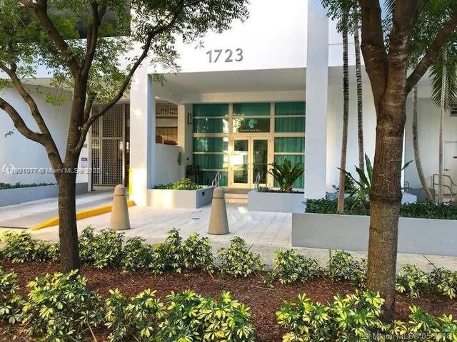 1723 SW 2nd Ave Unit 704, Miami, FL 33129 - view of front of property featuring stucco siding and french doors