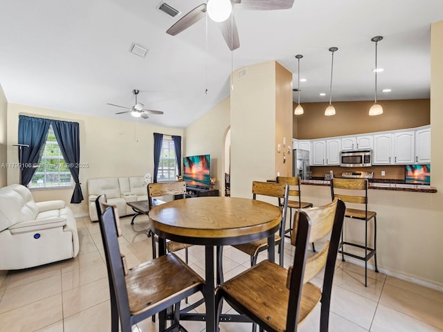 18760 SW 358th St, Homestead, FL 33034 - dining area with ceiling fan, plenty of natural light, baseboards, vaulted ceiling, and recessed lighting