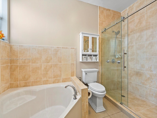 18760 SW 358th St, Homestead, FL 33034 - bathroom featuring toilet, a bath, a stall shower, and tile patterned flooring