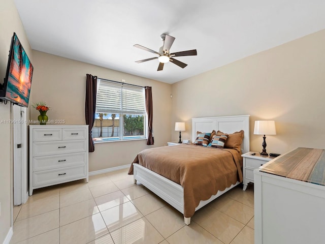 18760 SW 358th St, Homestead, FL 33034 - bedroom with light tile patterned floors, baseboards, and a ceiling fan