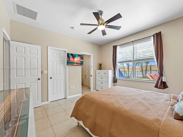 18760 SW 358th St, Homestead, FL 33034 - bedroom featuring light tile patterned floors, baseboards, and ceiling fan