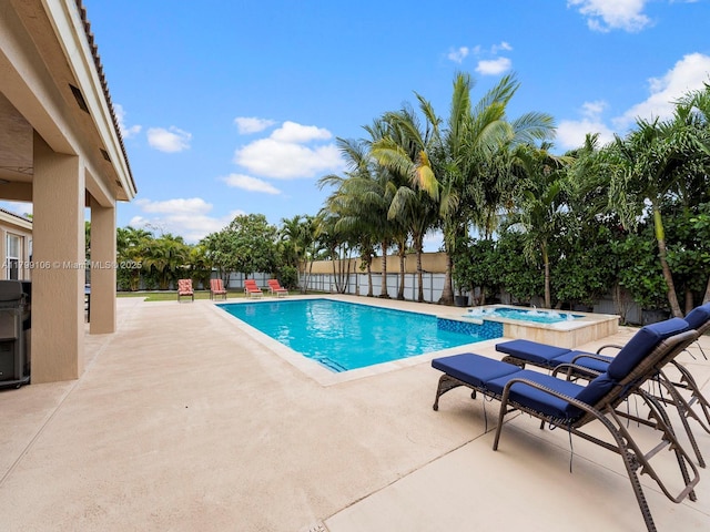 18760 SW 358th St, Homestead, FL 33034 - view of pool featuring a patio area, a fenced backyard, and a pool with connected hot tub