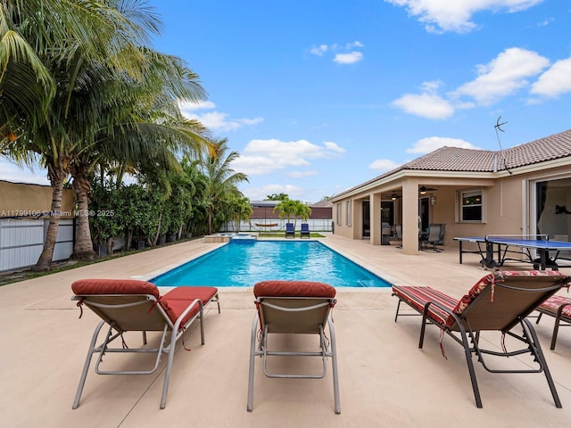 18760 SW 358th St, Homestead, FL 33034 - view of pool with a fenced backyard, a patio, a pool with connected hot tub, and ceiling fan