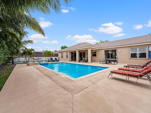 18760 SW 358th St, Homestead, FL 33034 - view of pool with a pool with connected hot tub, a patio area, and fence
