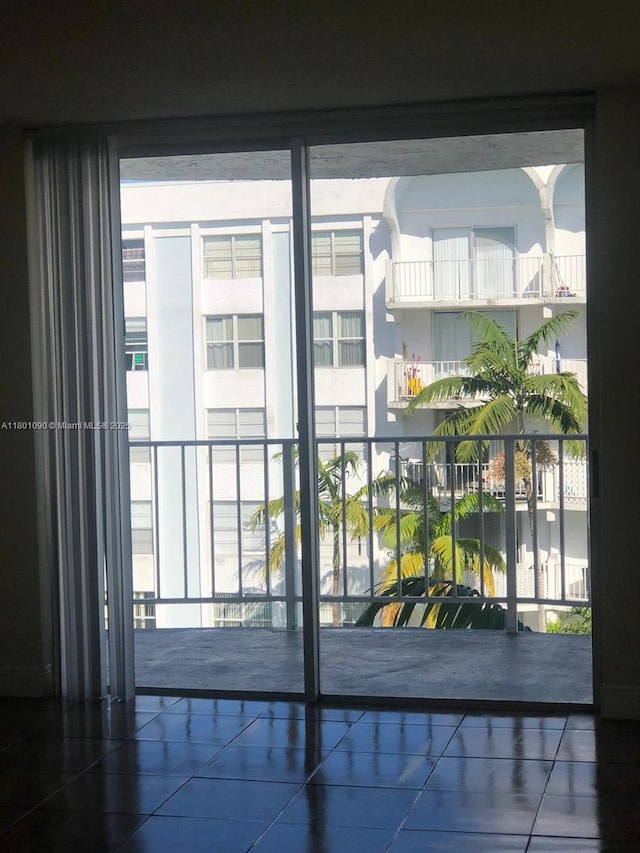 492 NW 165th St Rd Unit C514, Miami, FL 33169 - doorway featuring tile patterned flooring and plenty of natural light
