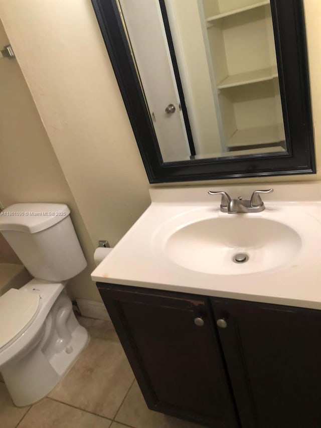 492 NW 165th St Rd Unit C514, Miami, FL 33169 - bathroom with vanity, toilet, and tile patterned floors