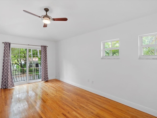 1125 Asturia Ave, Coral Gables, FL 33134 - spare room featuring healthy amount of natural light, baseboards, and light wood-style floors