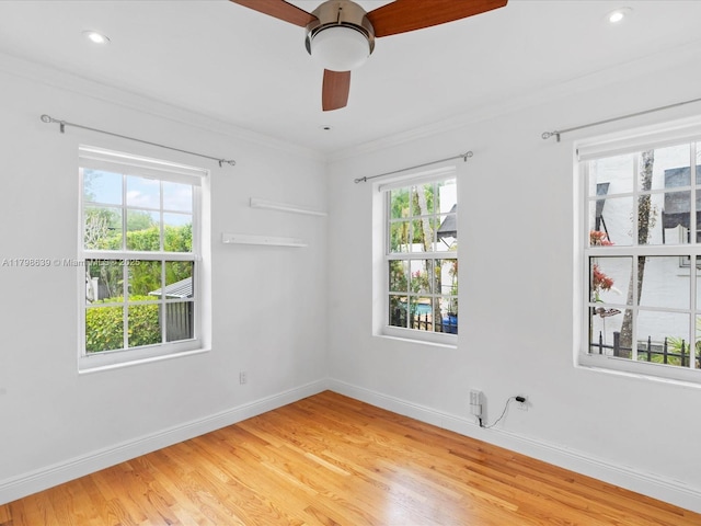 1125 Asturia Ave, Coral Gables, FL 33134 - unfurnished room featuring ceiling fan, light wood-style floors, crown molding, baseboards, and recessed lighting