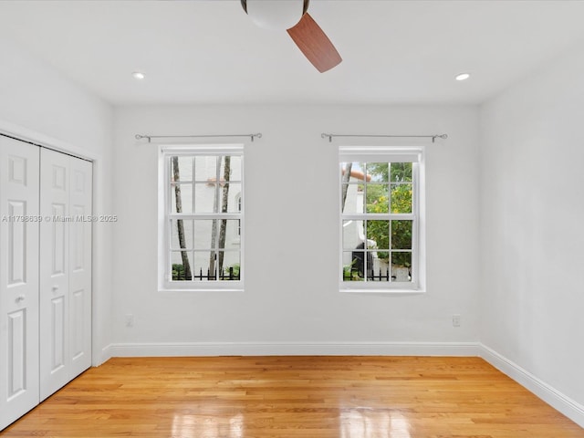 1125 Asturia Ave, Coral Gables, FL 33134 - unfurnished bedroom featuring light wood-type flooring, baseboards, a closet, recessed lighting, and a ceiling fan
