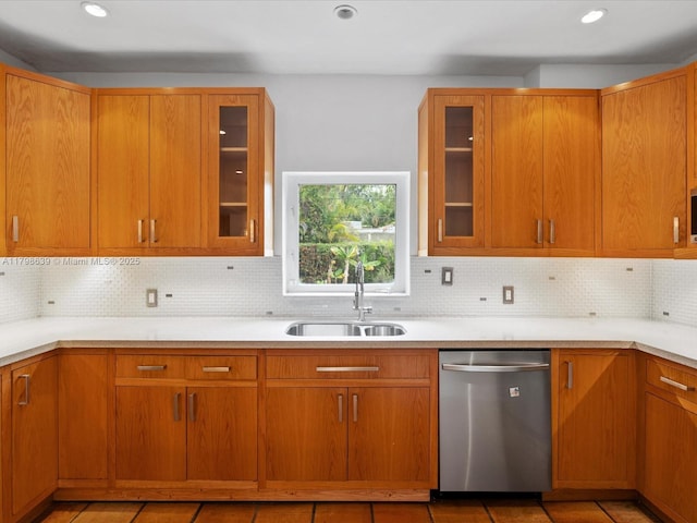1125 Asturia Ave, Coral Gables, FL 33134 - kitchen featuring stainless steel dishwasher, a sink, recessed lighting, light countertops, and tasteful backsplash