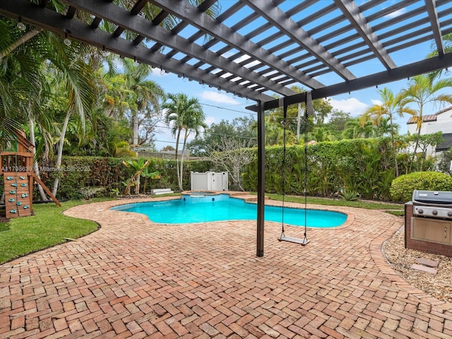 1125 Asturia Ave, Coral Gables, FL 33134 - view of swimming pool featuring an outdoor hot tub, a patio area, a playground, grilling area, and a pergola