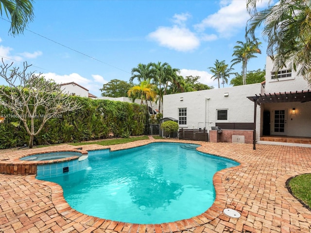 1125 Asturia Ave, Coral Gables, FL 33134 - view of pool with a pergola, a patio, a pool with connected hot tub, and a fenced backyard