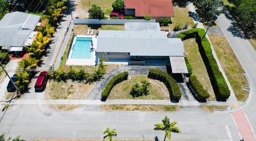1900 NE 180th St, North Miami Beach, FL 33162 - view from above of property featuring a pool area