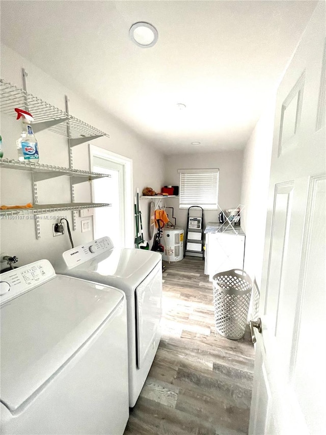 1900 NE 180th St, North Miami Beach, FL 33162 - washroom featuring separate washer and dryer and wood finished floors