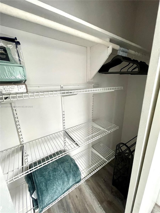 1900 NE 180th St, North Miami Beach, FL 33162 - walk in closet featuring wood finished floors