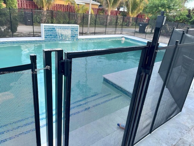 1900 NE 180th St, North Miami Beach, FL 33162 - view of swimming pool with fence