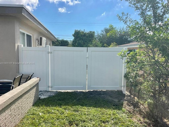 1900 NE 180th St, North Miami Beach, FL 33162 - view of yard with a gate