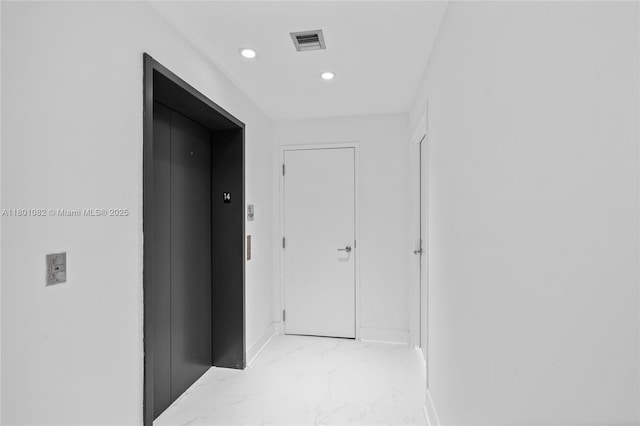 2900 NE 7th Ave Unit 1409, Miami, FL 33137 - hallway with elevator, light marble finish flooring, and recessed lighting