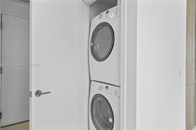 2900 NE 7th Ave Unit 1409, Miami, FL 33137 - washroom with stacked washing machine and dryer