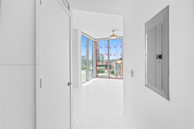 2900 NE 7th Ave Unit 1409, Miami, FL 33137 - hall featuring a wall of windows and electric panel