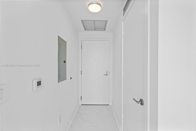 2900 NE 7th Ave Unit 1409, Miami, FL 33137 - hallway with light marble finish flooring and electric panel