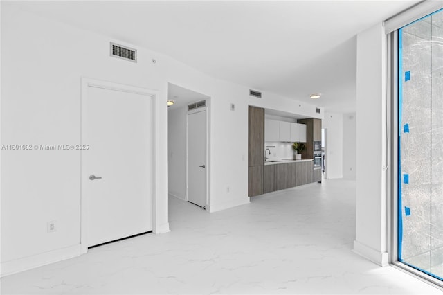 2900 NE 7th Ave Unit 1409, Miami, FL 33137 - unfurnished room with light marble finish floors and a sink