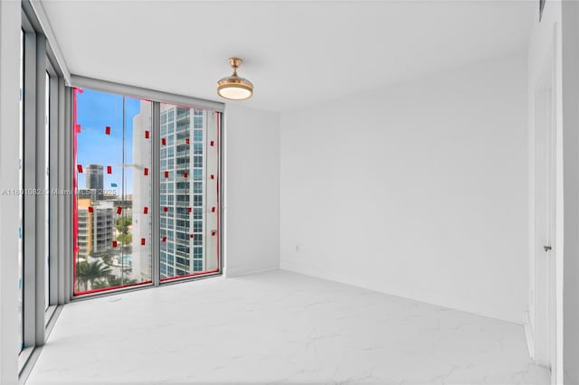 2900 NE 7th Ave Unit 1409, Miami, FL 33137 - empty room with marble finish floors and a city view