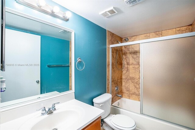7620 Westwood Dr Unit 216, Tamarac, FL 33321 - full bathroom with vanity, toilet, and enclosed tub / shower combo