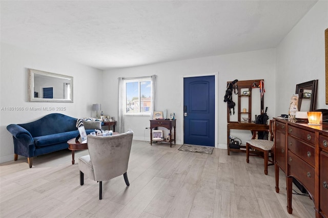 6811 SW 5th Ter, Miami, FL 33144 - living area featuring light wood finished floors and baseboards