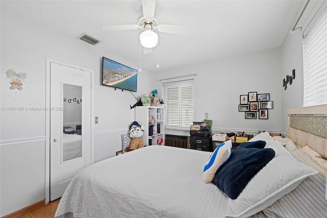 6811 SW 5th Ter, Miami, FL 33144 - bedroom with wood finished floors and ceiling fan