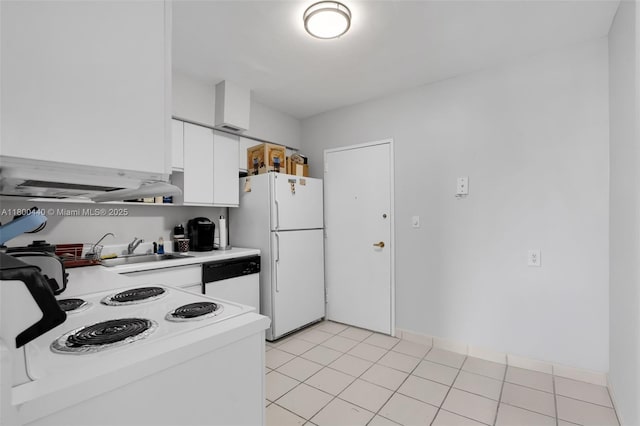 5700 Collins Ave Unit 4A, Miami Beach, FL 33140 - kitchen with white appliances, a sink, light countertops, white cabinets, and under cabinet range hood