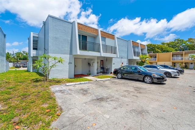 6306 Moseley St Unit 1, Hollywood, FL 33024 - view of property featuring uncovered parking