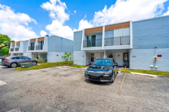 6306 Moseley St Unit 1, Hollywood, FL 33024 - view of building exterior with uncovered parking