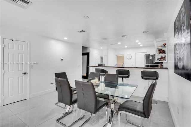6306 Moseley St Unit 1, Hollywood, FL 33024 - dining room featuring recessed lighting, baseboards, and light tile patterned floors