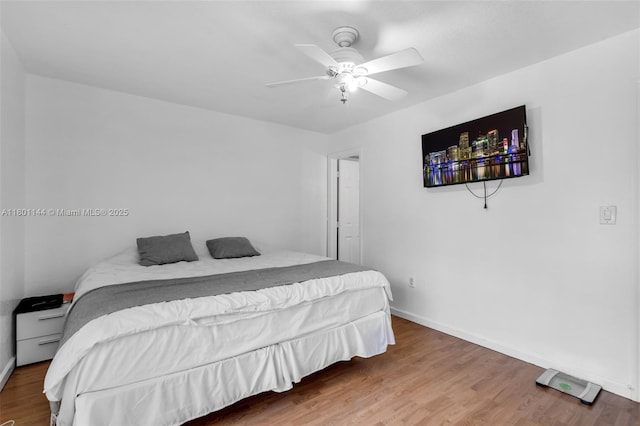 6306 Moseley St Unit 1, Hollywood, FL 33024 - bedroom featuring baseboards, wood finished floors, and ceiling fan