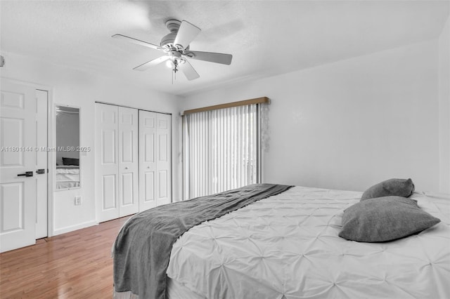 6306 Moseley St Unit 1, Hollywood, FL 33024 - bedroom featuring wood finished floors, a ceiling fan, a closet, and a textured ceiling