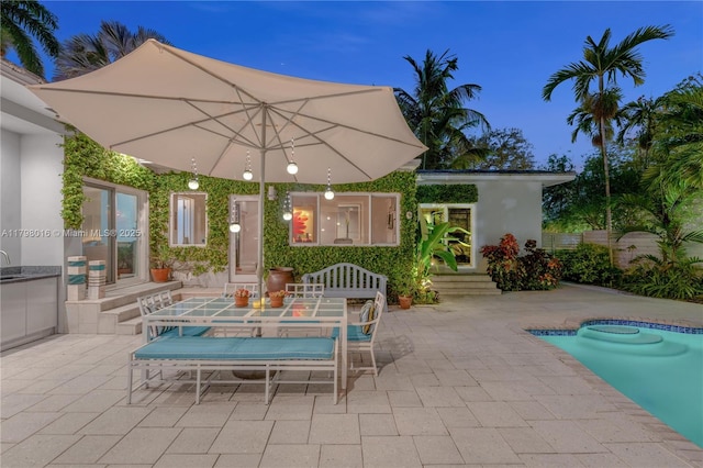 5550 N Bayshore Dr, Miami, FL 33137 - view of patio / terrace featuring an outdoor pool