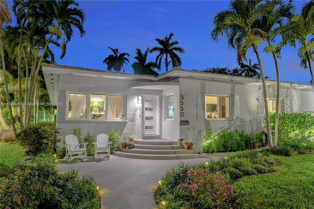 5550 N Bayshore Dr, Miami, FL 33137 - view of front of house with stucco siding