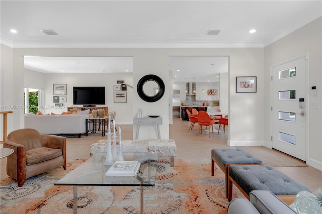5550 N Bayshore Dr, Miami, FL 33137 - living area featuring crown molding, recessed lighting, and wood finished floors