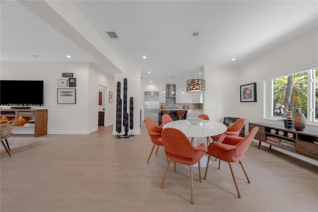 5550 N Bayshore Dr, Miami, FL 33137 - dining space with recessed lighting and light wood-style flooring