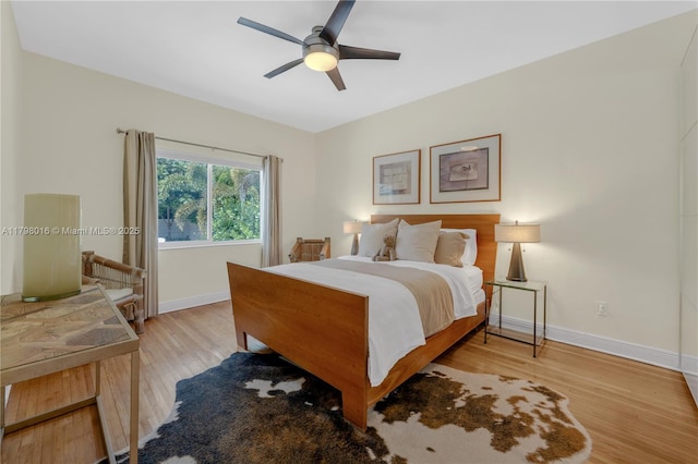 5550 N Bayshore Dr, Miami, FL 33137 - bedroom featuring wood finished floors and a ceiling fan