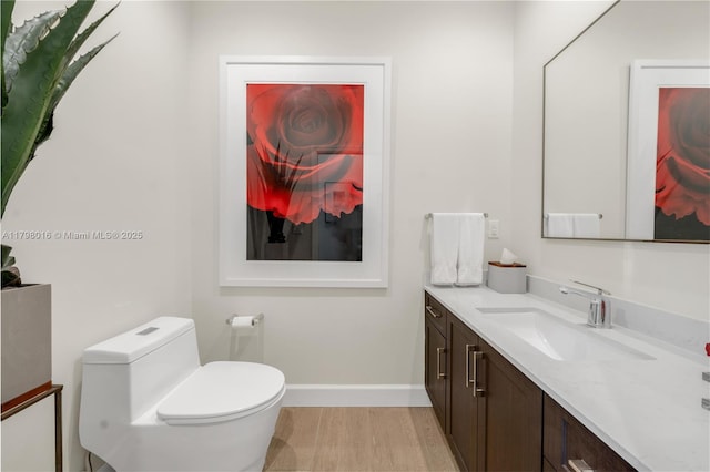 5550 N Bayshore Dr, Miami, FL 33137 - bathroom featuring vanity and wood finished floors