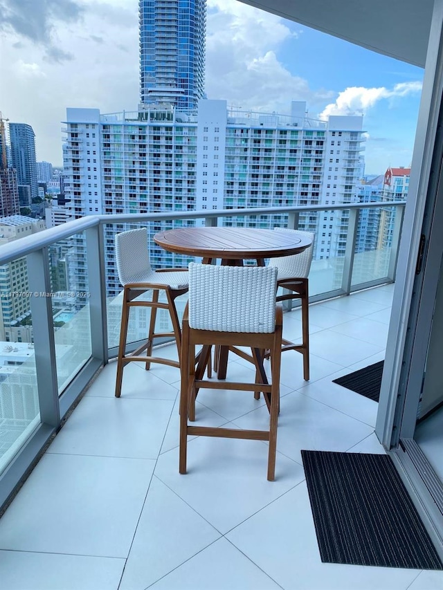 balcony featuring a city view