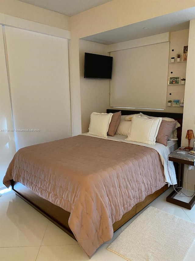 bedroom with tile patterned floors