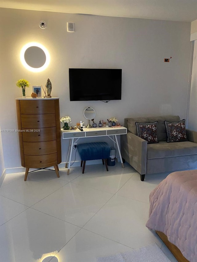bedroom featuring light tile patterned flooring